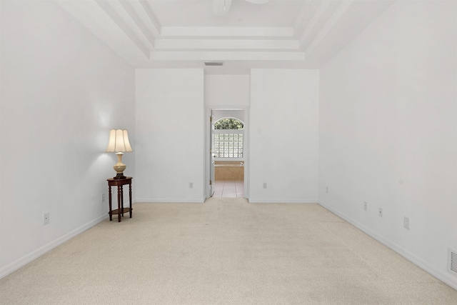 546 Sevilla Dr, Saint Augustine, FL 32086 - carpeted spare room with a raised ceiling and baseboards