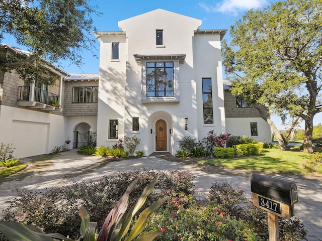 view of front of property featuring a garage