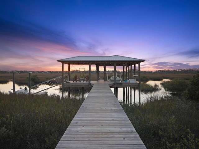 dock area featuring a water view