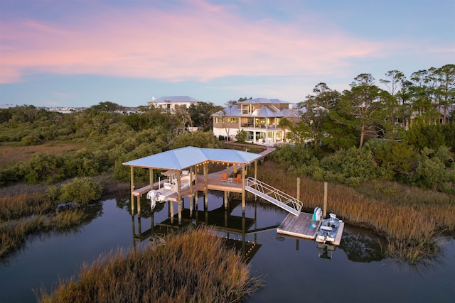 dock area with a water view