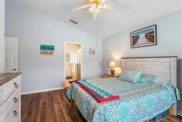1505 Sundown Ln, Clermont, FL 34711 - bedroom featuring lofted ceiling, dark wood finished floors, baseboards, ceiling fan, and connected bathroom