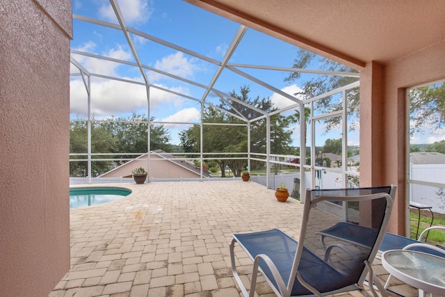 1505 Sundown Ln, Clermont, FL 34711 - outdoor pool featuring a patio area and glass enclosure