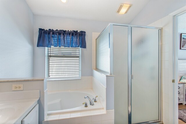 1505 Sundown Ln, Clermont, FL 34711 - bathroom featuring vanity, a stall shower, and a garden tub
