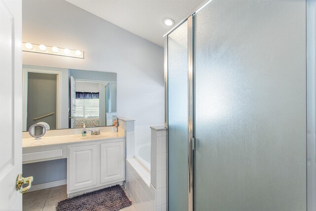 1505 Sundown Ln, Clermont, FL 34711 - bathroom with a stall shower, tile patterned floors, a garden tub, and vanity