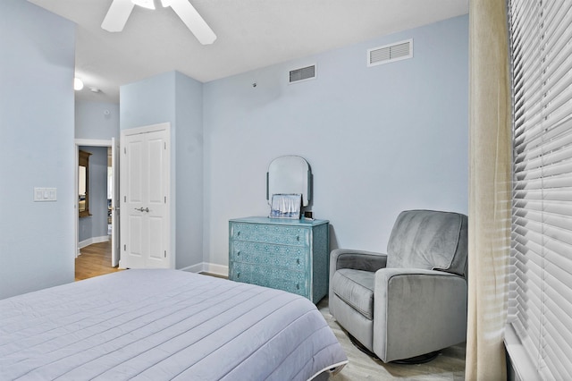 bedroom featuring ceiling fan and light wood-type flooring