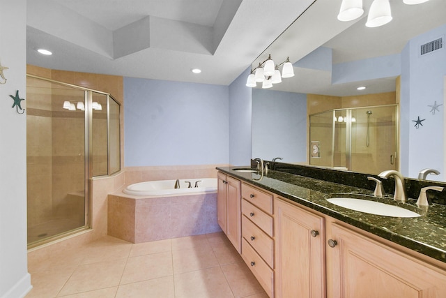 435 N Ocean Grande Dr Unit 104, Ponte Vedra Beach, FL 32082 - bathroom featuring a shower stall, double vanity, a garden tub, tile patterned floors, and recessed lighting