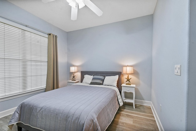 435 N Ocean Grande Dr Unit 104, Ponte Vedra Beach, FL 32082 - bedroom with wood finished floors and a ceiling fan