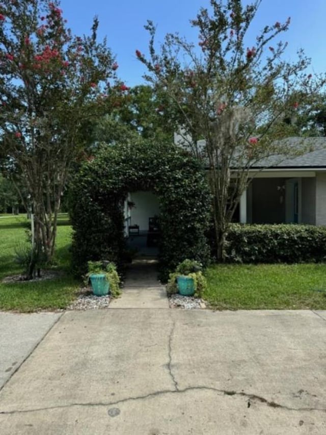 view of home's exterior with a lawn