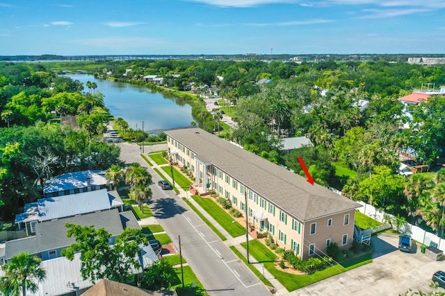 drone / aerial view with a water view