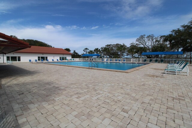 24 Aledo Ct, Saint Augustine, FL 32086 - pool with a patio area and fence