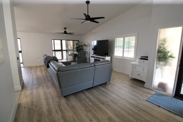 24 Aledo Ct, Saint Augustine, FL 32086 - living room featuring a healthy amount of sunlight, light wood finished floors, ceiling fan, and baseboards