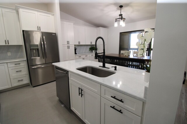 24 Aledo Ct, Saint Augustine, FL 32086 - kitchen featuring stainless steel refrigerator with ice dispenser, tasteful backsplash, white cabinets, a sink, and dishwashing machine