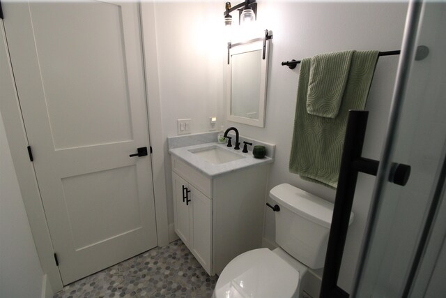 24 Aledo Ct, Saint Augustine, FL 32086 - bathroom featuring vanity, toilet, and tile patterned floors