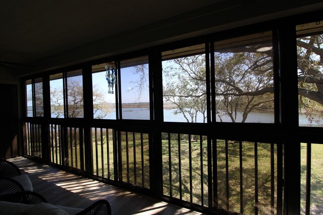 24 Aledo Ct, Saint Augustine, FL 32086 - unfurnished sunroom featuring a wealth of natural light and a water view