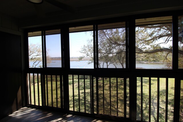 24 Aledo Ct, Saint Augustine, FL 32086 - unfurnished sunroom with a water view