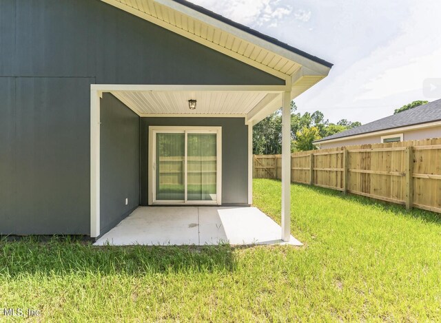 exterior space with a yard and a patio