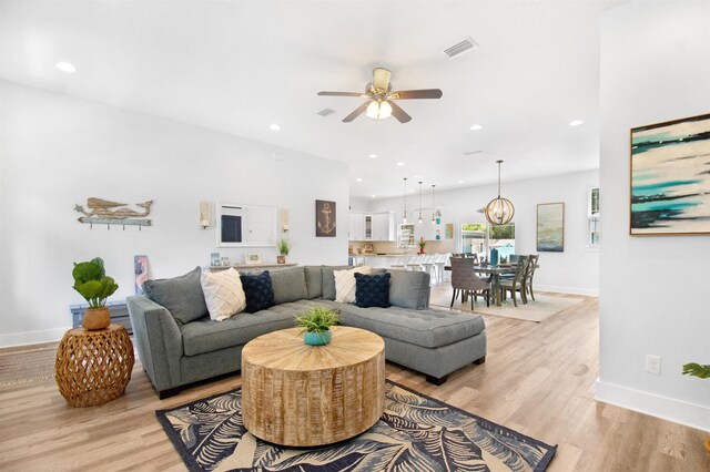 13 Court Edna, Saint Augustine, FL 32084 - living room featuring a ceiling fan, light wood-style floors, recessed lighting, and baseboards