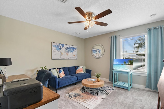 13 Court Edna, Saint Augustine, FL 32084 - living room with carpet, ceiling fan, a textured ceiling, and baseboards