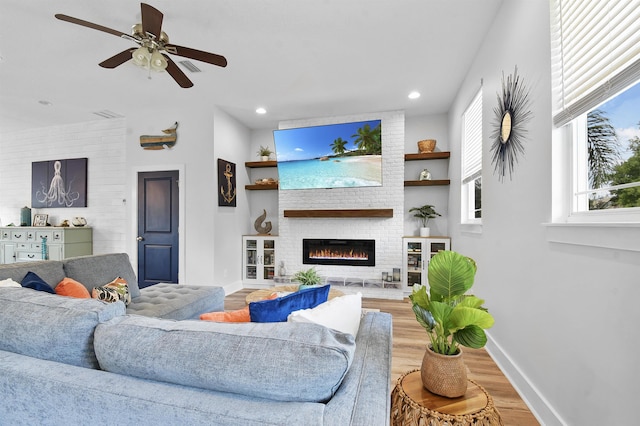 13 Court Edna, Saint Augustine, FL 32084 - living area with wood finished floors, baseboards, a glass covered fireplace, recessed lighting, and ceiling fan
