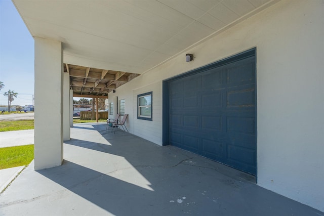 view of patio with a garage