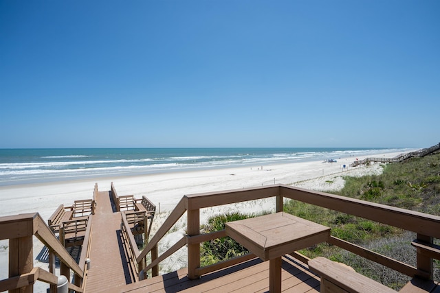 property view of water featuring a beach view