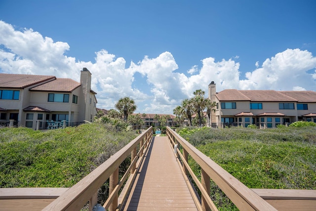 view of dock with a residential view