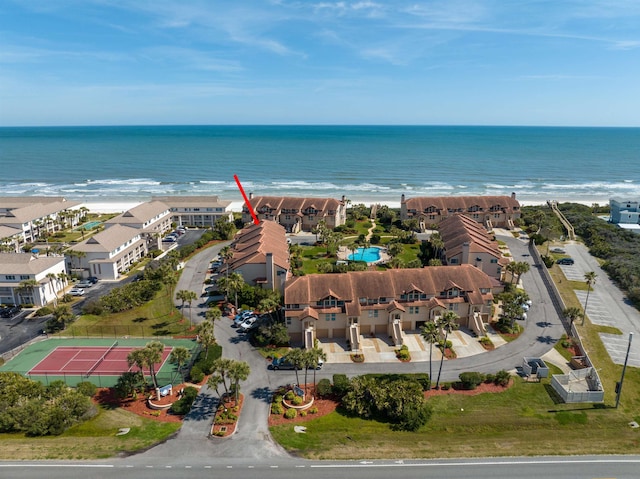 aerial view featuring a water view and a residential view