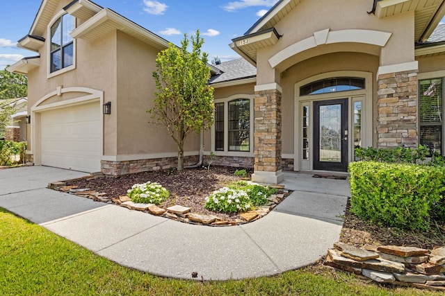 153 Savanna Preserve Ct, Saint Augustine, FL 32095 - doorway to property featuring stone siding and stucco siding