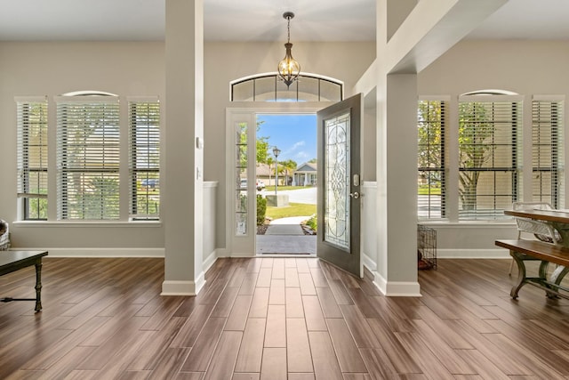 153 Savanna Preserve Ct, Saint Augustine, FL 32095 - foyer entrance featuring wood finished floors, baseboards, and a chandelier