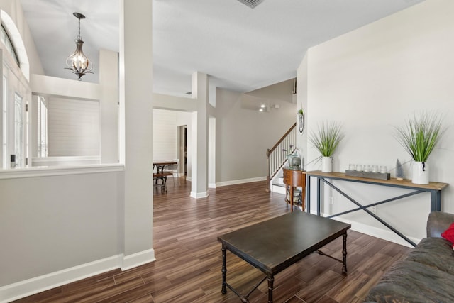 153 Savanna Preserve Ct, Saint Augustine, FL 32095 - living room with wood finished floors, baseboards, and stairs