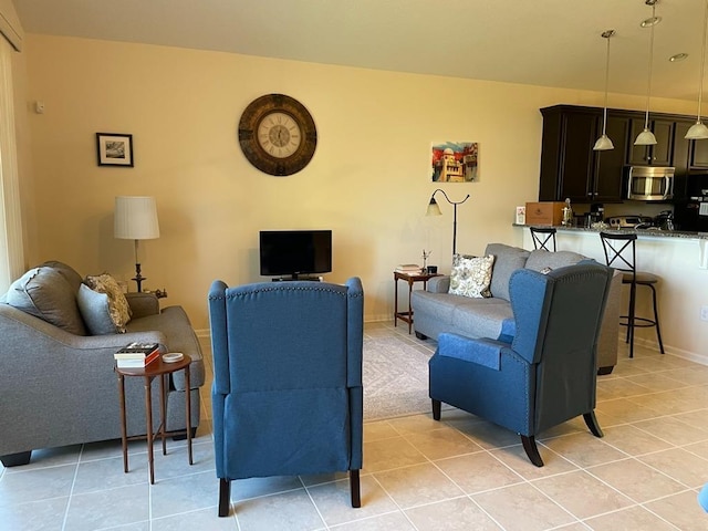 living room featuring light tile patterned flooring