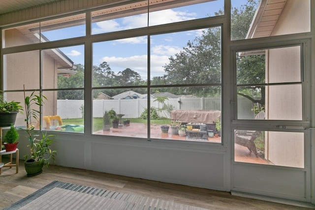 132 Fallen Timber Way, Saint Augustine, FL 32084 - unfurnished sunroom with healthy amount of natural light and wood finished floors