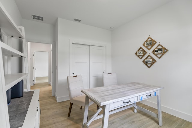 1 Clementon Ln, Palm Coast, FL 32137 - home office with light wood-type flooring and baseboards