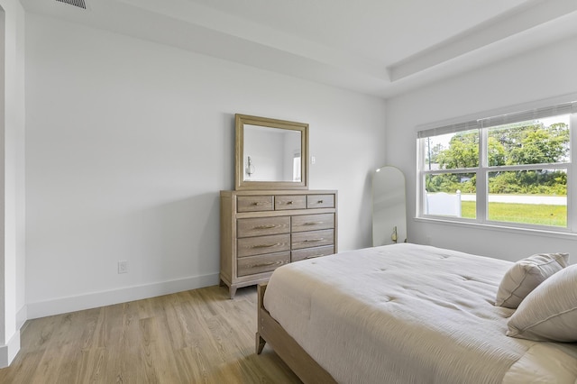1 Clementon Ln, Palm Coast, FL 32137 - bedroom with baseboards and light wood-type flooring