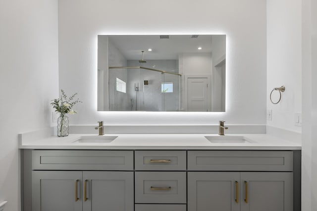 1 Clementon Ln, Palm Coast, FL 32137 - bathroom with double vanity and a shower stall