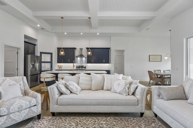 1 Clementon Ln, Palm Coast, FL 32137 - living area with wood finished floors, beam ceiling, a high ceiling, and recessed lighting