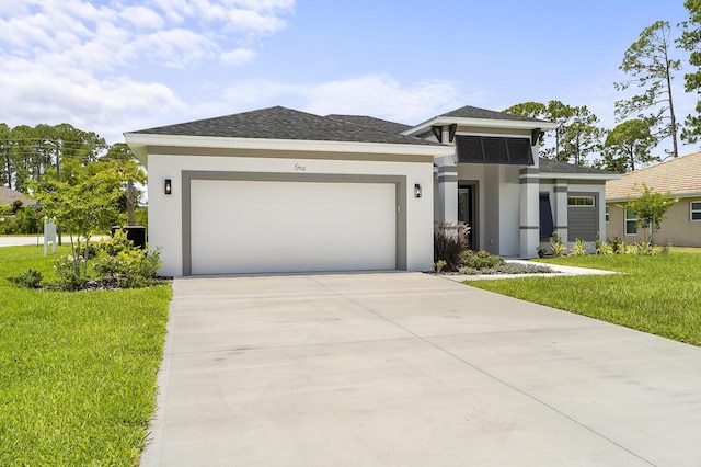 1 Clementon Ln, Palm Coast, FL 32137 - prairie-style home featuring stucco siding, concrete driveway, a front lawn, a garage, and a shingled roof