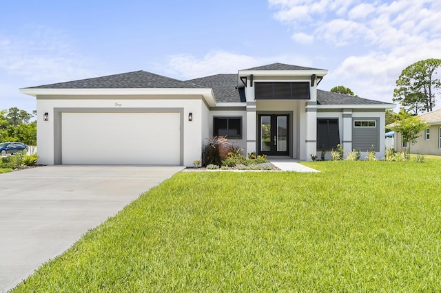 1 Clementon Ln, Palm Coast, FL 32137 - prairie-style house featuring stucco siding, a garage, roof with shingles, driveway, and a front yard