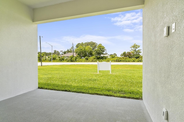 1 Clementon Ln, Palm Coast, FL 32137 - view of grassy yard with a patio