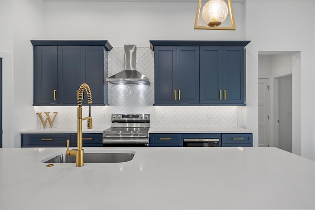 1 Clementon Ln, Palm Coast, FL 32137 - kitchen with wall chimney range hood, appliances with stainless steel finishes, light countertops, and backsplash