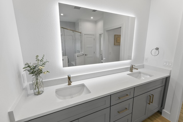1 Clementon Ln, Palm Coast, FL 32137 - full bath featuring double vanity, a shower stall, and wood finished floors