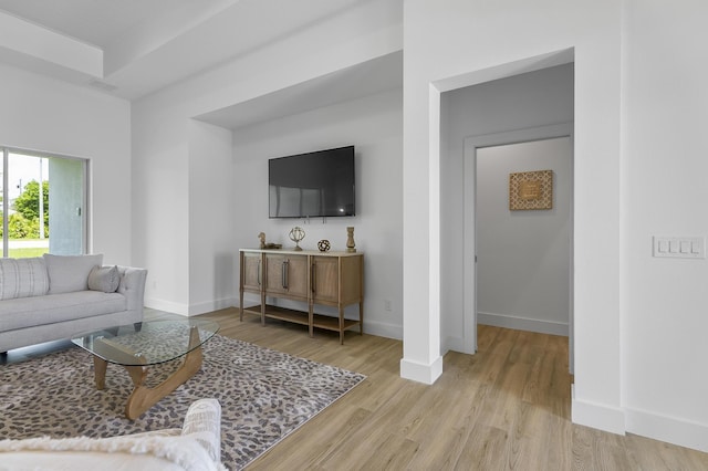 1 Clementon Ln, Palm Coast, FL 32137 - living room featuring light wood-type flooring and baseboards