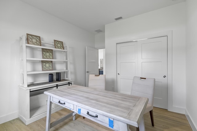 1 Clementon Ln, Palm Coast, FL 32137 - home office with light wood finished floors and baseboards