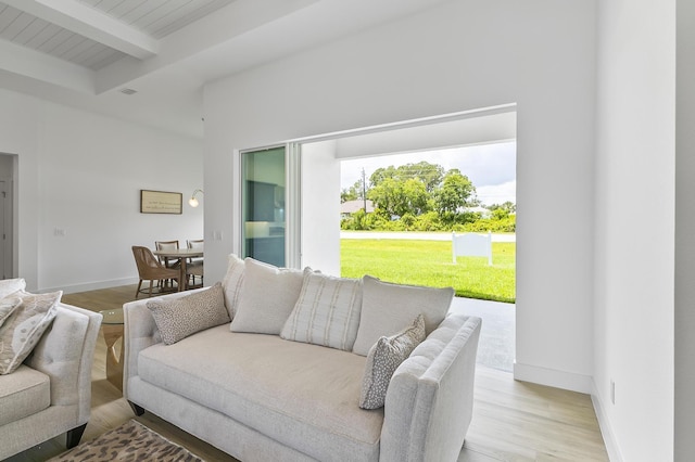 1 Clementon Ln, Palm Coast, FL 32137 - living room with beamed ceiling and light wood-type flooring