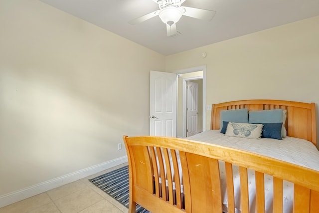 bedroom with tile patterned floors and ceiling fan