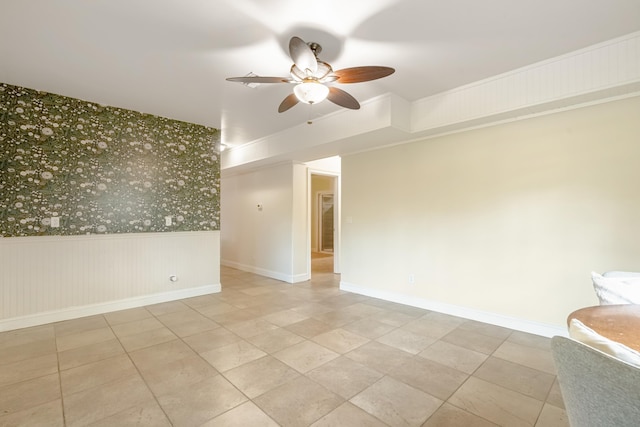 unfurnished room with ceiling fan