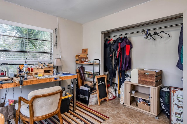 home office with light tile patterned floors