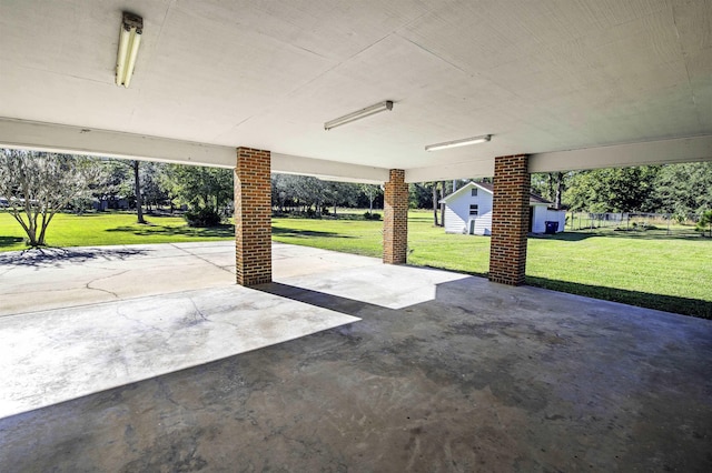 view of patio / terrace with a shed