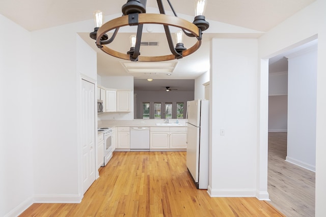 kitchen featuring white appliances, light hardwood / wood-style floors, and white cabinetry