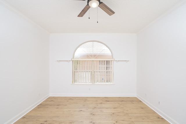 unfurnished room with light hardwood / wood-style floors, ceiling fan, and ornamental molding